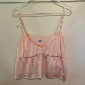 Silky pink cropped cami from Aritzia